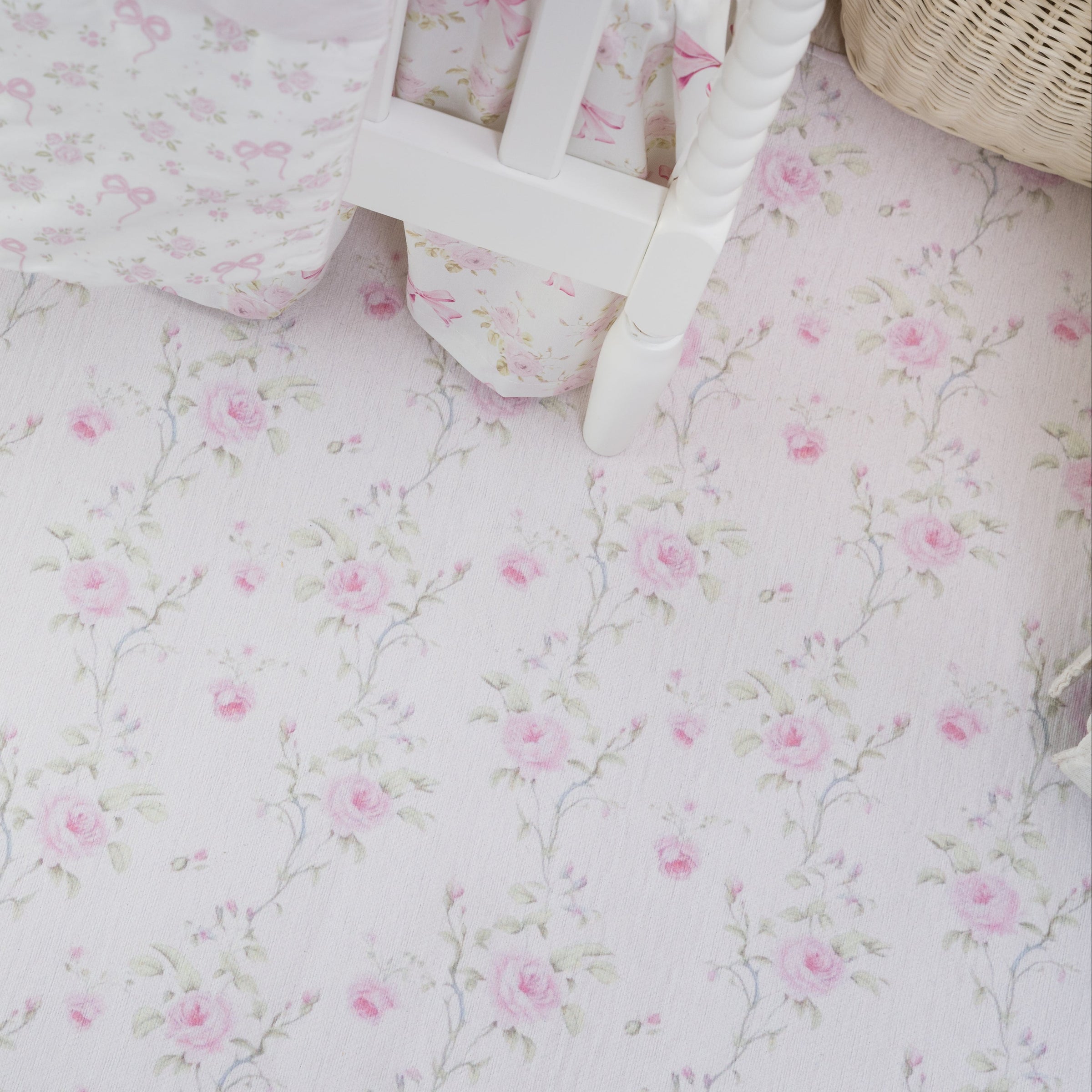 Floral patterned fabric with a basket on a matching background