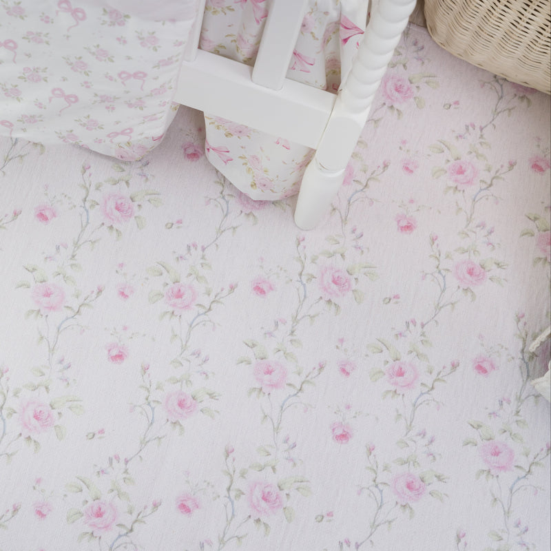 Floral patterned fabric with a basket on a matching background